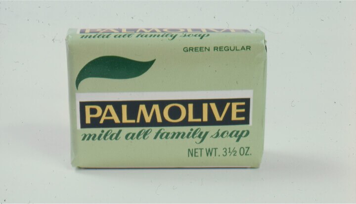 Soap bar with green packaging labeled Palmolive Mild All Family Soap from 1898.