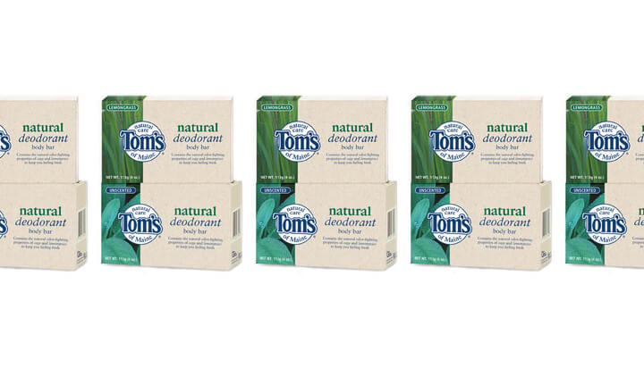 Five boxes of Toms Natural Deodorant, each featuring blue and green packaging, arranged in a row.